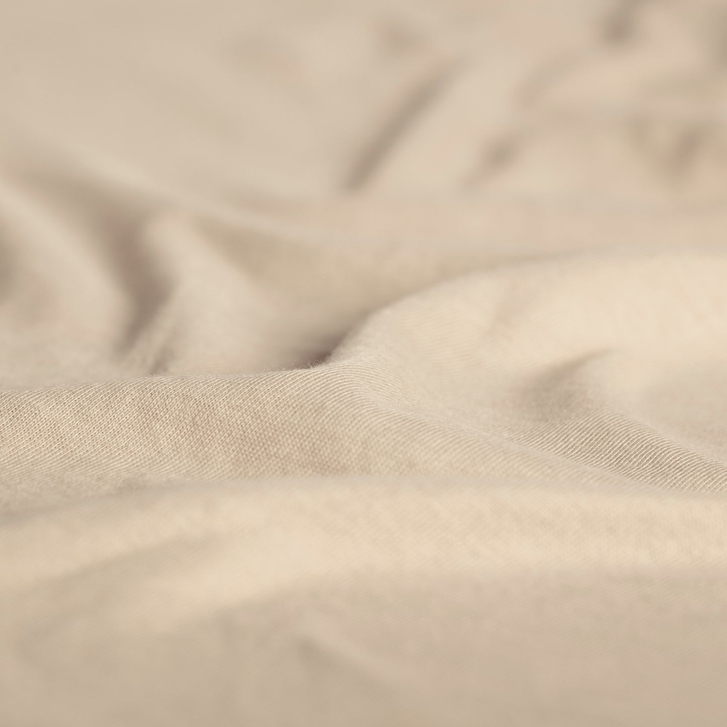 Hoeslaken jersey licht zand