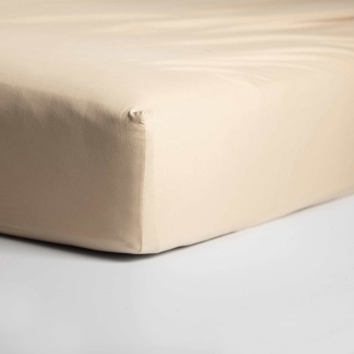 Hoeslaken jersey licht zand